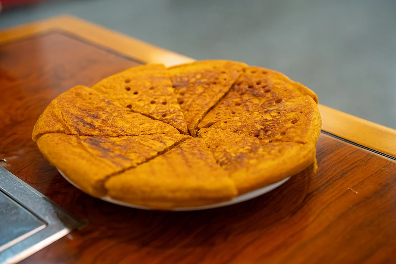 Steamed grain cake with a soft crumb — scenic food photograph in China